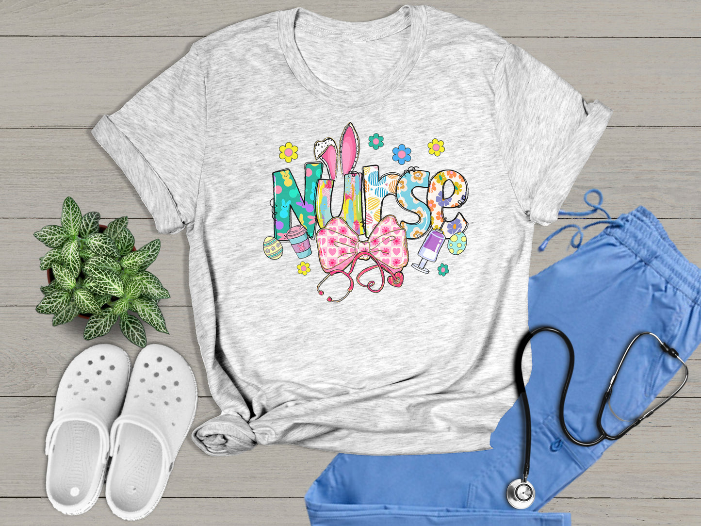 Nurse Bunny Ears & Bow Cute Colorful Graphic Unisex T-Shirt | Trendy Easter Apparel for Medical Professionals